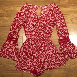 Hollister red romper with white flowers
